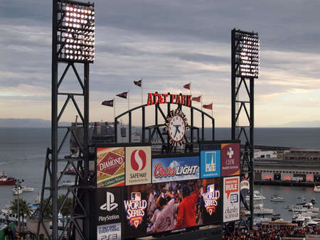 SAN FRANCISCO, CA - OCTOBER 28: ATT Park HDTV Scoreboard in the outfield bleachers displays World Series video, with boats in McCovey cove in the distance, game 2 of the 2010 World Series game between Giants and Rangers Oct. 28, 2010 AT&T Park San Francisのeditorial素材