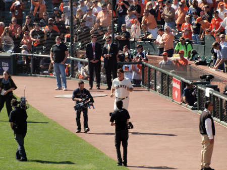 SAN FRANCISCO, CA - OCTOBER 19: San Francisco Giants vs. Philadelphia Phillies: Giants Manager Bruce Bochy runs out on to the field during pregame intros before the start of game three of the NLCS 2010 taken October 19, 2010 AT&T Park San Francisco Califoのeditorial素材