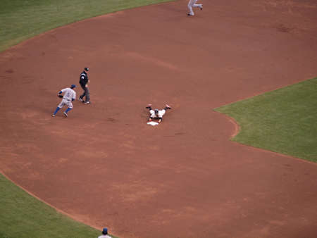 SAN FRANCISCO, CA - OCTOBER 28: Giants Cody Ross slides into second hands first during double game 2 of the 2010 World Series game between Giants and Rangers Oct. 28, 2010 AT&T Park San Francisco, CA. のeditorial素材
