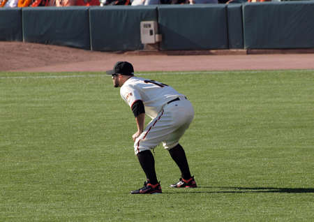 SAN FRANCISCO, CA - OCTOBER 19: San Francisco Giants vs. Philadelphia Phillies: left fielder Cody Ross squats ready for the play game three of the NLCS 2010 taken October 19, 2010 AT&T Park San Francisco California. のeditorial素材