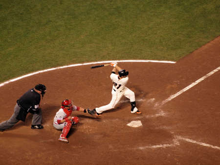 SAN FRANCISCO, CA - OCTOBER 20: Giants vs. Phillies: Freddy Sanchez swings for contact in the batters box with Carlos Ruiz catching game four of the NLCS 2010 October 20, 2010 AT&T Park San Francisco.   のeditorial素材