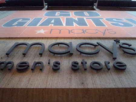 SAN FRANCISCO, CA - NOVEMBER 2: Go Giants Sign hung on Macy's Men's Store to honor Giants Playoff run Nov. 2, 2010 Union Square San Francisco, CA. のeditorial素材