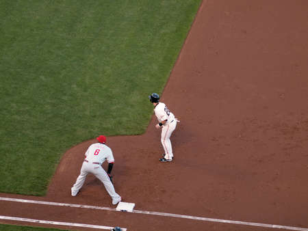 SAN FRANCISCO, CA - OCTOBER 20: Giants vs. Phillies: Buster Posey takes lead from first with Ryan Howard standing on the base game four of the NLCS 2010 October 20, 2010 AT&T Park San Francisco. のeditorial素材