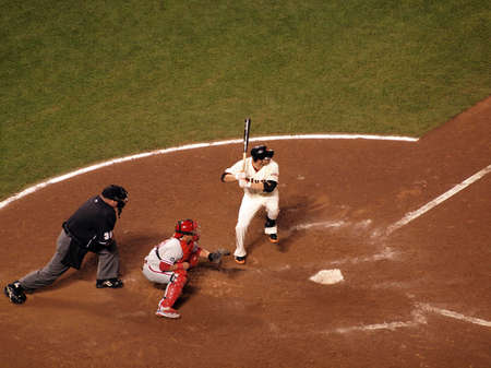 SAN FRANCISCO, CA - OCTOBER 20: Giants vs. Phillies: Freddy Sanchez lifts foot into the air in batters box waiting for pitch with Carlos Ruiz catching game four of the NLCS 2010 October 20, 2010 AT&T Park San Francisco. のeditorial素材