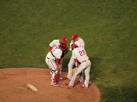 SAN FRANCISCO, CA - OCTOBER 20: Phillies infield talks with pitcher Ryan Madson on the mounds game 4 of the 2010 NLCS game between Giants and Phillies Oct. 20, 2010 AT&T Park San Francisco, CA. のeditorial素材
