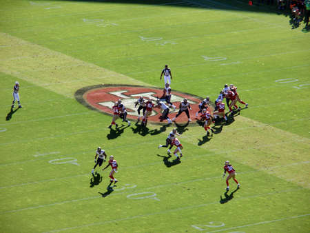 SAN FRANCISCO, CA - NOVEMBER 14: St.Louis Rams vs. San Francisco 49ers: lRams QB Sam Bradford sets to throw deep while standing on 49ers logo at Candlestick Stadium San Francisco California Sunday November 14 2010.のeditorial素材