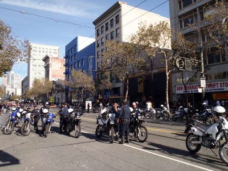 SAN FRANCISCO, CA - NOVEMBER 3: Police offices hang out on market street on dirt bikes keeping the peace after Giants World Series Parade Nov. 3, 2010 San Francisco, CA.のeditorial素材