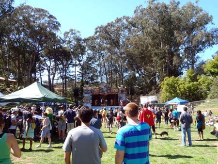 SAN FRANCISCO - SEPTEMBER 25:  men in robes rape on stage in the distance as Tour De Fat concert begins to take shape taken September 25, 2010 Golden Gate Park San Francisco.のeditorial素材