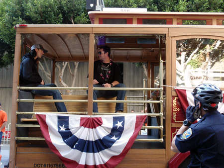 SAN FRANCISCO, CA - NOVEMBER 3: Giants prepare for start of world championship parade with Tim Lincecum and dan runzler sitting, talkng and smiling in trolly car Nov. 3, 2010 San Francisco, CA.のeditorial素材