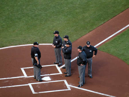 SAN FRANCISCO, CA - OCTOBER 20: head Umpire talk to five other umpires at homeplate before start of game 4 of the 2010 NLCS game between Giants and Phillies Oct. 20, 2010 AT&T Park San Francisco, CA. のeditorial素材