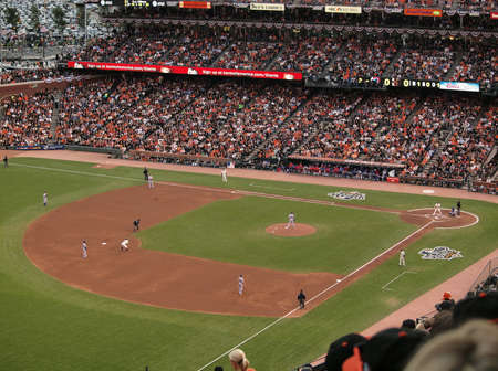 SAN FRANCISCO, CA - OCTOBER 28: Rangers C.J. Wilson sets to throw with Cody Ross taking lead at  second and Aubrey Huff at bat game 2 of the 2010 World Series game between Giants and Rangers Oct. 28, 2010 AT&T Park San Francisco, CA. のeditorial素材