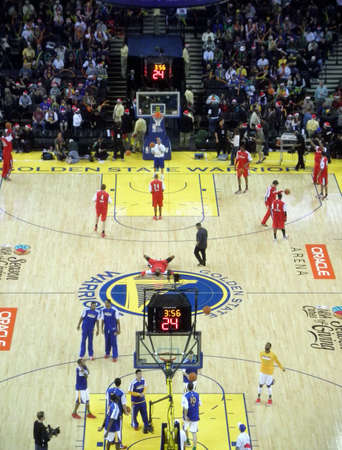 OAKLAND, CA - DECEMBER 25: Portland Blazers vs. Golden State Warriors: Teams warm-up at half time by taking shoots at the basket at the Oracle Arena taken December 25, 2010 Oakland California.のeditorial素材