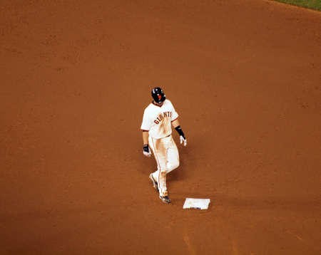 SAN FRANCISCO, CA - OCTOBER 20: GGiants Buster Posey walks back to second base in a dirty uniform game 4 of the 2010 NLCS game between Giants and Phillies Oct. 20, 2010 AT&T Park San Francisco, CA. のeditorial素材