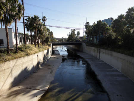 Small river flows down waterway in Culver City, LA.の写真素材