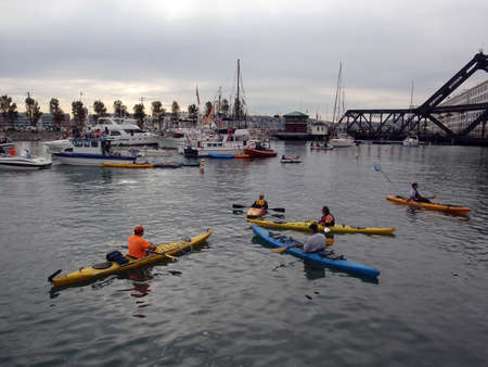 SAN FRANCISCO, CA - OCTOBER 27: kayaker sit in McCovey Cove having fun waiting for balls with 3rd street bridge in the background during game 1 of the 2010 World Series Oct. 27, 2010 AT&T Park San Francisco, CA.のeditorial素材