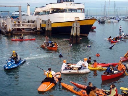 SAN FRANCISCO, CA - OCTOBER 27: McCovey Cove filled with people on rafts and Kayaks in front of Ferry with  SFPD on jetski keeping the waters safe during game 1 of the 2010 World Series game between Giants and Rangers Oct. 27, 2010 AT&T Park San Franciscoのeditorial素材