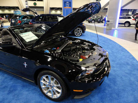 SAN FRANCISCO, CA - NOVEMBER 20: Black Ford Mustang displayed with hood open at the 53rd San Francisco International Auto Show, on Saturday November 20 2010 San Francisco CA. のeditorial素材