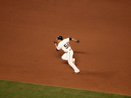 SAN FRANCISCO, CA - OCTOBER 20: Giants Andres Torres running towards third base, game 4 of the 2010 NLCS game between Giants and Phillies Oct. 20, 2010 AT&T Park San Francisco, CA. のeditorial素材