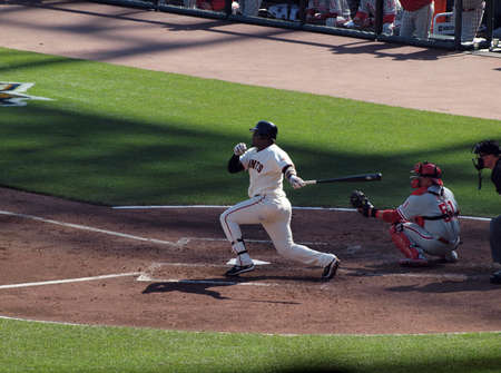 SAN FRANCISCO, CA - OCTOBER 19: Giants vs. Phillies:Giants Batter Juan Uribe connects with pitch game three of the NLCS 2010 taken October 19, 2010 AT&T Park San Francisco. のeditorial素材