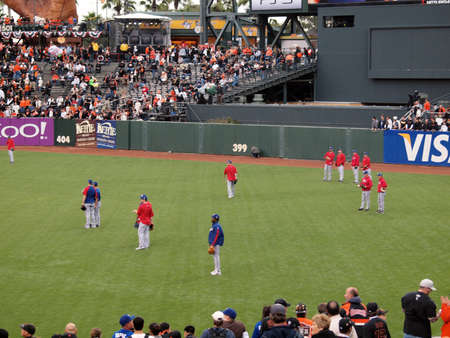 SAN FRANCISCO, CA - OCTOBER 28: Rangers players standing in the outfield taking balls during batting practice game 2 of 2010 World Series game 2between Giants and Rangers Oct. 28, 2010 AT&T Park San Francisco のeditorial素材