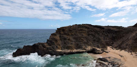 People enjoy Halona Cove on the South shore of Oahu, Hawaiiの写真素材