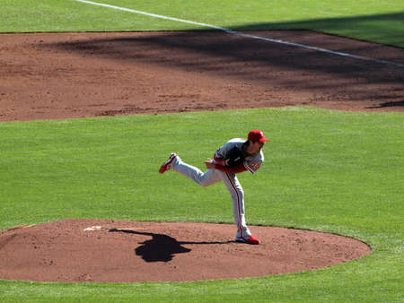 SAN FRANCISCO, CA - OCTOBER 19: Philles Cole Hamels steps though pitch lifting back leg into the air 2010 NLCS game 3 between Giants and Phillies Oct. 19, 2010 AT&T Park San Francisco, CA.のeditorial素材