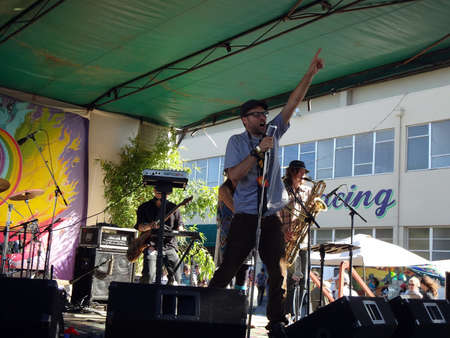 SONOMA, CA - JUNE 11:MC Yogi points finger into the air as he sings on stage at Harmony Festival 2011 on June 11, 2011 in Sonoma, CA. のeditorial素材