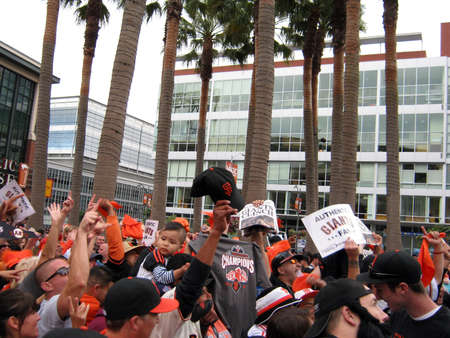 SAN FRANCISCO - OCTOBER 2: Giants Fans go crazy for Cameras outside ballpark after winning the NL West Division. October 3 2010 Att Park San Francisco California. のeditorial素材