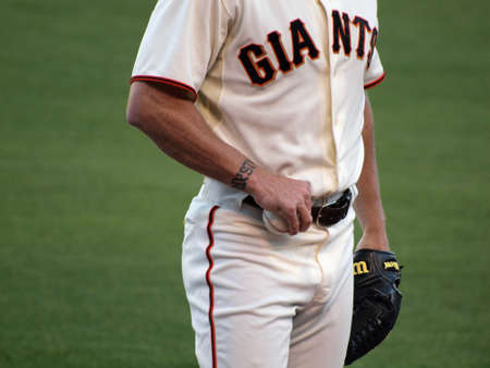Giants Vs. Marlins: Close-up of Giants Brian Wilson hand holding a baseball and mid section as he warms-up to close.  July 28  2010 Att Park San Francisco Californiaのeditorial素材