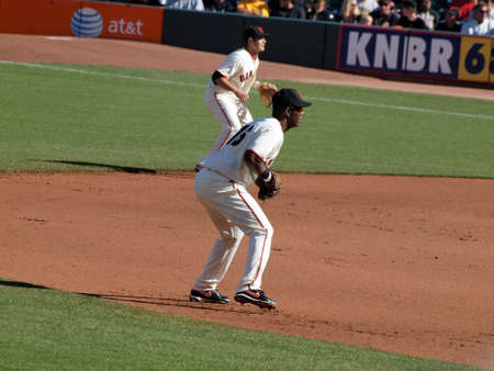SAN FRANCISCO - JULY 28  Giants Middle infielders Edgar Renteria  and Freddy Sanchez stand in position waiting for play action on July 28 2010 at Att Park in San Francisco California.のeditorial素材