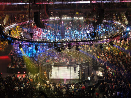 OAKLAND, CA - FEBRUARY 20: Wrestlers fight on top turnbuckle during Elimination Chamber match during Pay-Per-View at Oracle Arena taken February 20, 2011 Oakland, California.のeditorial素材