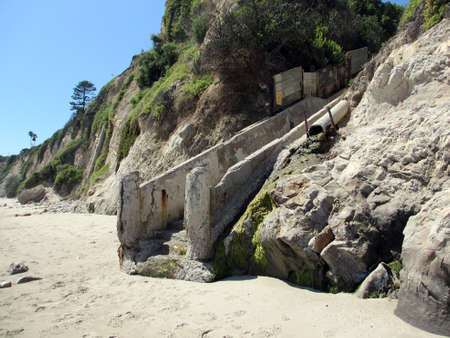 Well worn staircase in the side of mountain leading to the beach in Santa Barbara, California の写真素材