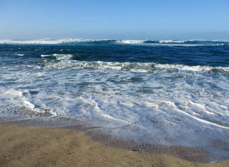 Waves crash on beach Turtle bay Beach in the North Shore of Oahu, Hawaii.                               の写真素材