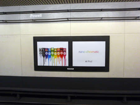 SAN FRANCISCO - NOVEMBER 4: Ipod Nano nano-chromatic ad on wall in BART Powell street subway station, Apple Ipod have change the Music industry moving away from CD to a digital format. November 4, 2008 in San Francisco, California.のeditorial素材