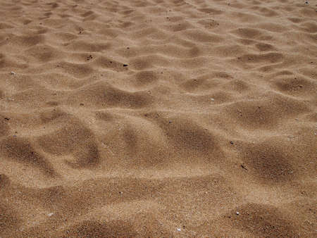 Grains of Kaanapali Maui Beach Sand and shells forming a pattern of hills and valleys dune like. の写真素材