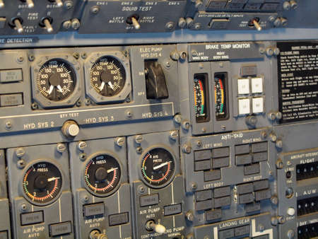 Jet aircraft cockpit Equipment with various indicators, buttons, dials, and instruments.の写真素材