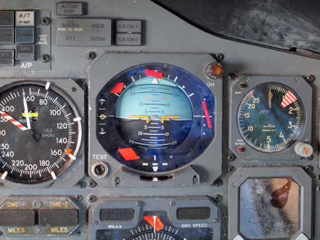 Jet aircraft cockpit Equipment with various indicators, buttons, dials, and instruments.の写真素材