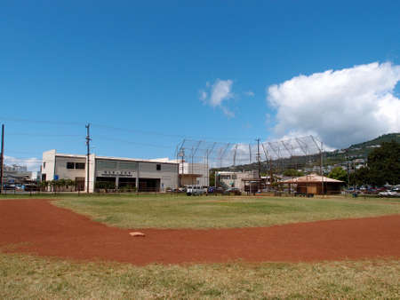 Empty Baseball Field at Mo'Ili'Ili Neighborhood Park on a beautiful day on Oahu, Hawaii.の写真素材