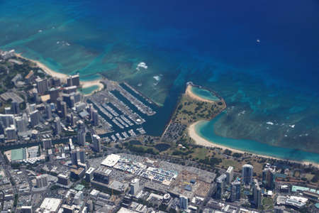 Waikiki, Ala Wai Canal, Ala Moana Mall, Park, Convention Center, Condos, Hotels of Honolulu and Ocean Aerial view during the day.  Oahu, Hawaiiの写真素材