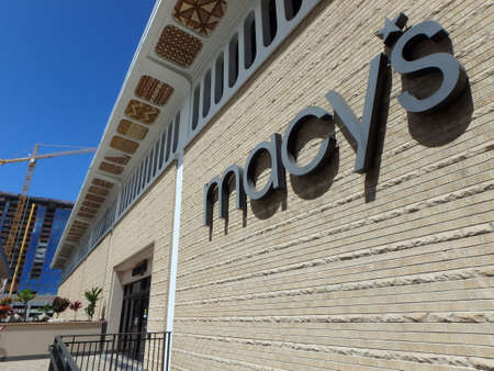 HONOLULU, HI - JUNE 27, 2014: Macy's store in Honolulu with building under construction in the distance. Macy's is a mid-range to upscale chain of department stores owned by American multinational corporation Macy's, Inc. のeditorial素材