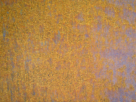 rusted orange brown metal corroded pattern texture, great for backgrounds.の写真素材