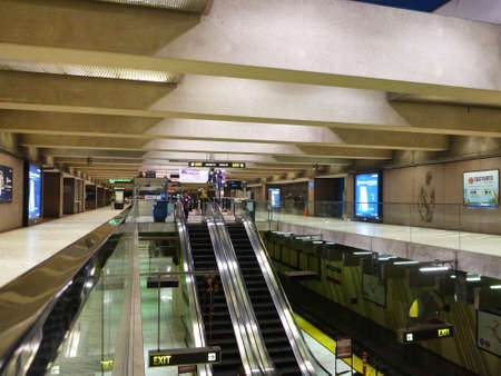 SAN FRANCISCO - JUNE 15: Inside Underground Embarcadero Metro Station in San Francisco June 15, 2013 in San Francisco CA.  The Transportation station is the last stop before the underwater transbay tunnel across the bay to Oakland.のeditorial素材