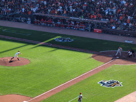 SAN FRANCISCO, CA - OCTOBER 19: San Francisco Giants vs. Philadelphia Phillies: Pitcher Matt Cain throws pitch to batter Shane Victorino with ball in air and Buster Posey catching game three of the NLCS 2010 taken October 19, 2010 AT&T Park San Francisco のeditorial素材