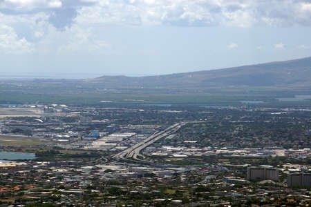 Aerial view of H-1 Highway as it passes by the airport heading to pearl harbor on Oahu, Hawaii.の写真素材