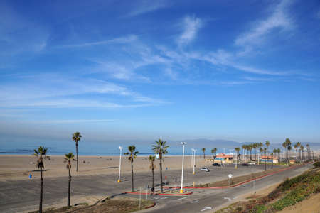 Beach, Pacific ocean, park, parking lot, and restroom buildings in the early morning at Dockweiler Beach State Park, Playa Del Rey in LA, California.  January 2014.のeditorial素材