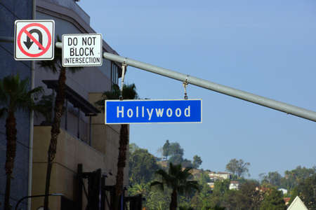 LOS ANGELES, USA - JANUARY 23: Blue and white Hollywood Boulevard street sign on January 23, 2014 in Los Angeles, California.  Hollywood Boulevard is a street in Hollywood, Los Angeles, California, splitting off Sunset Boulevard in the east and running noのeditorial素材