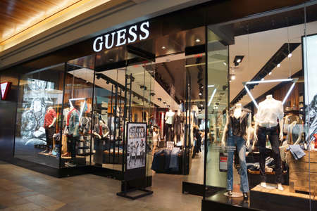 HONOLULU, HAWAII - AUGUST 7: Guess Shop on August 7, 2014 in Ala Moana Mall on Oahu, the store is an American upscale clothing line brand and during the 1980s was one of the most popular brands of jeans.のeditorial素材