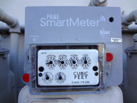 BERKELEY, CA - MAY 28: PG&E (utility co)  electricity SmartMeters on residential building. SmartMeters monitor energy quality and provide real time energy consumption data. Assembled in Mexico. Taken MAY 28, 2011 Berkeley, California.のeditorial素材