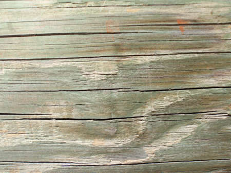 close up of green tint wooden planks good for backgrounds and textures.の写真素材
