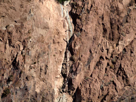 Rugged cliff face, carved away during construction of the Hoover Dam on the border of Arizona and Nevada in the USA.の写真素材